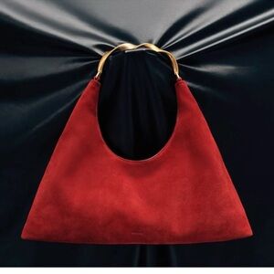 Red Suede Shoulder Bag with Sculpted Gold Handle